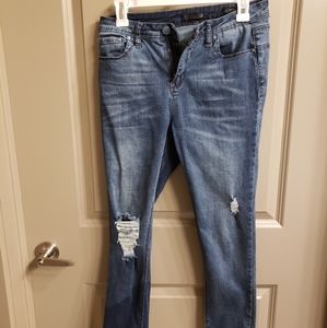 Lala Anthony distressed ripped skinny jeans